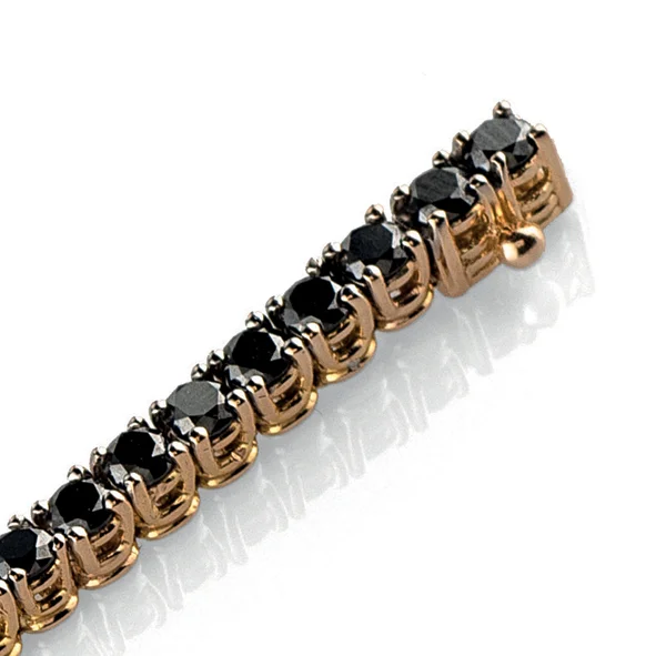 Bracciale tennis in oro rosa 18 carati con diamanti neri rotondi incastonati, design elegante e contemporaneo firmato TorinoGioielli